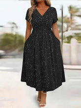 Load image into Gallery viewer, Black dress with pockets and white sparkle patterns